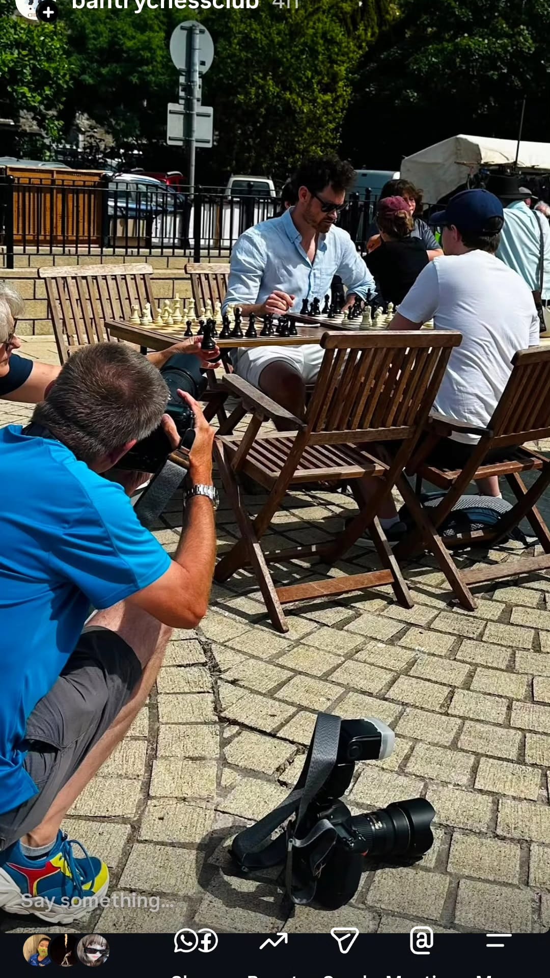 A photographer capturing the Checkmate for Charity games in Bantry Town Square