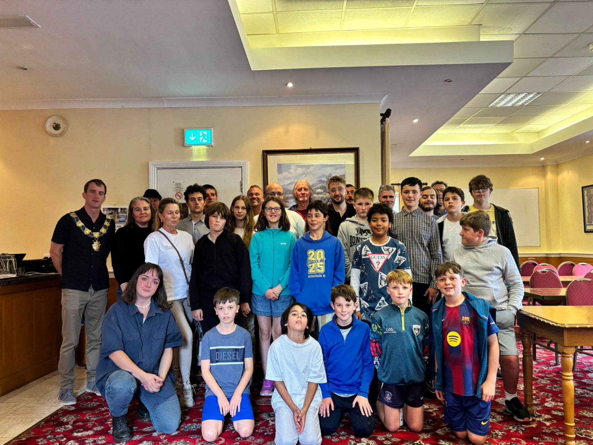 Large group photo of Bantry Chess Club members and juniors with the Mayor of Clonakilty