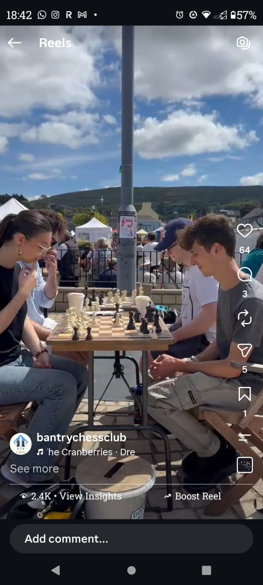 Two players focused on a game in the sunshine at Checkmate for Charity in Bantry Town Square